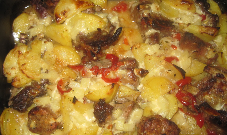 Запеченные ребрышки в сметанном соусе