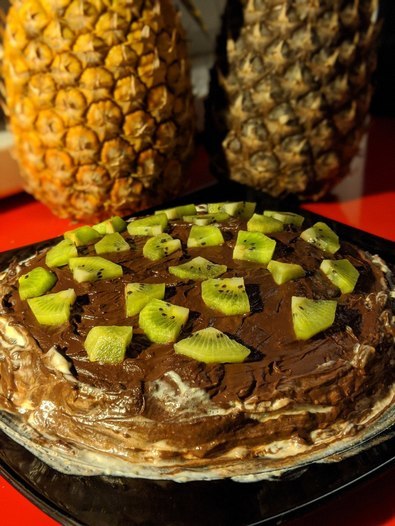 Шоколадный блинный торт с апельсиновым крем-чизом