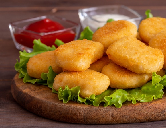 Кости, соль и соевая мука: пищевой технолог раскрыл, как часто можно есть покупные наггетсы и посоветовал альтернативу
