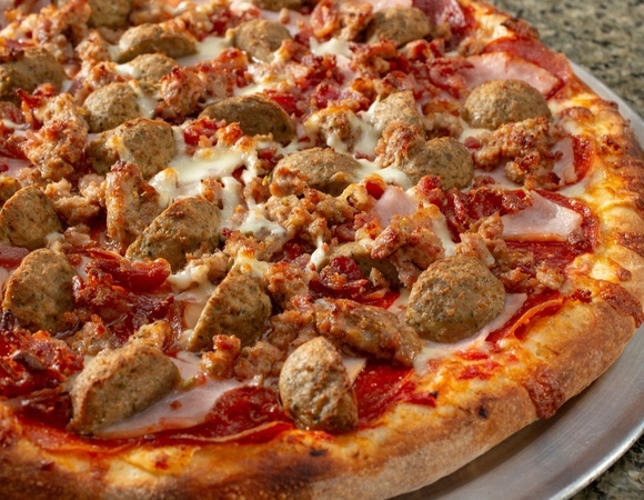 Гастроэнтеролог назвала наиболее "тяжелые" виды пиццы