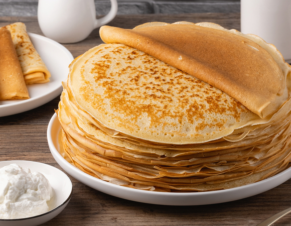 Классические, на пиве, тыквенные и с манкой — рецепты идеальных блинов от шеф-поваров