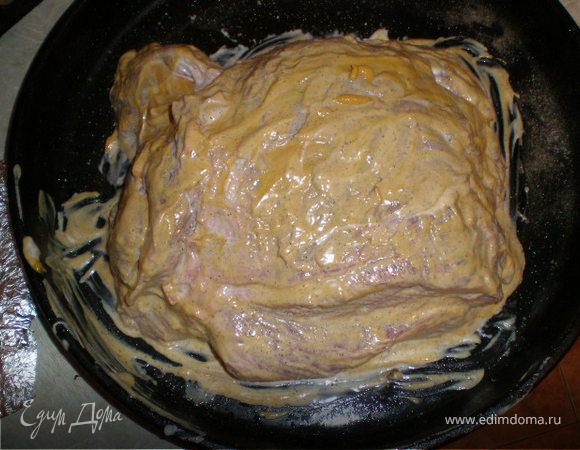 Шпигуем мясо морковью, чесноком - солим, перчим, натираем майонезом, полностью все в горчице. Оборачиваем фольгой и выпекаем около 2 -2,5 часов при 180 градусов.