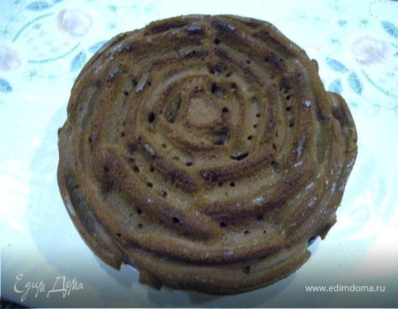 Вылить в форму смазанную раст. маслом (если силиконовая - то не смазывать). Выпекать при температуре 140-160 С (при более высокой "рвет крышу") около 1 часа. Готовность проверить зубочисткой.