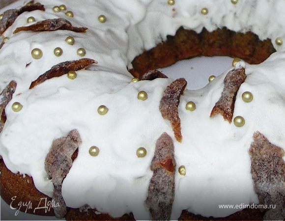 Белок взбить постепенно добавляя сахарную пудру(количество зависит от размера яйца).В готовую помадку(не переставая взбивать)постепенно добавить лимонный сок.Украсить готовый частично охлаждённый кекс помадкой и полосками хурмы.Приятного аппетита!