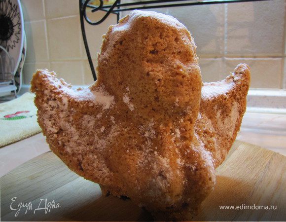 Посыпать сахарной пудрой крылья и волосы ангела.
