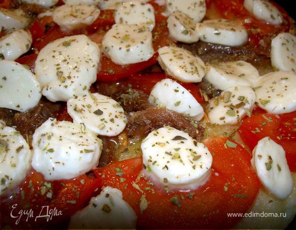 Обильно посыпьте сушеным орегано. 