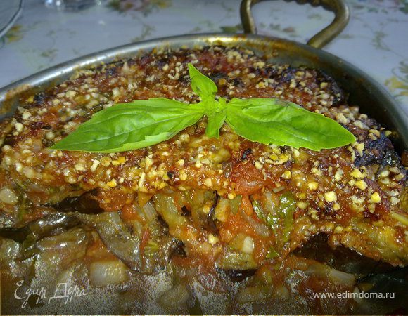 Поставить в духовку и запекать при 190 градусов пока верхний слой не подрумяниться.
 Подавать как горячим, так и холодным.
