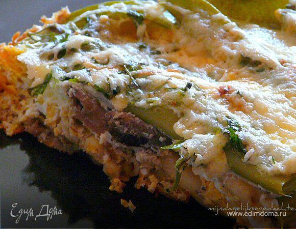 Поджарить несколько минут грибы с чесноком и вмешать крем-сыр.
Смазать форму/сковороду оливковым маслом. Духовку разогреть до 180С. В форму сложить фасиль, пасту и грибы, залить яично-молочной смесью, посыпать сыром и петрушкой и выпекать ок.25 минут.