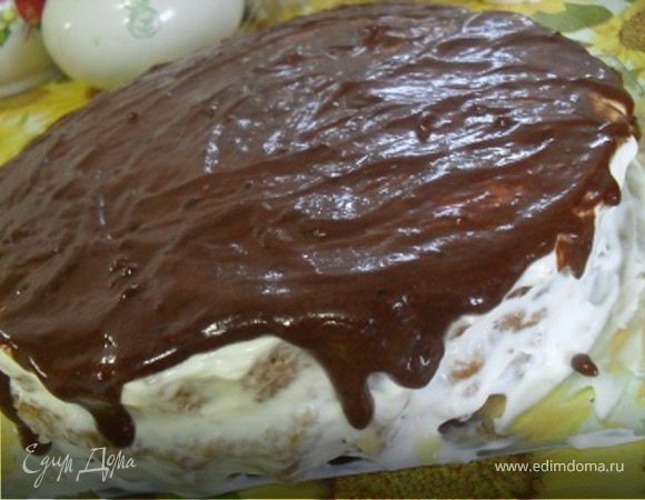 Готовый торт полить растопленным шоколадом, украсить цветами из мастики.