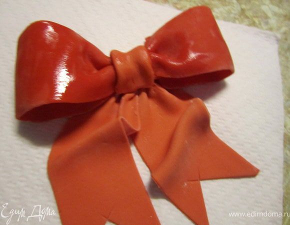 Прикрепить к банту.