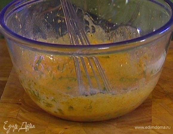 Влить газированную воду, добавить муку и кинзу и еще раз взбить кляр.