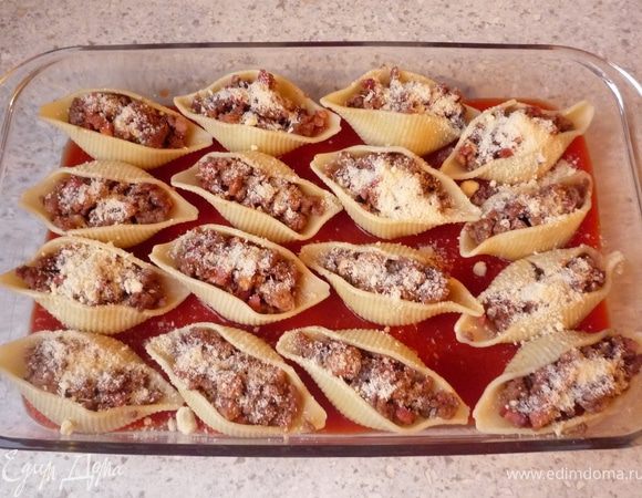 Посыпать пармезаном и запечь в духовке минут 20.