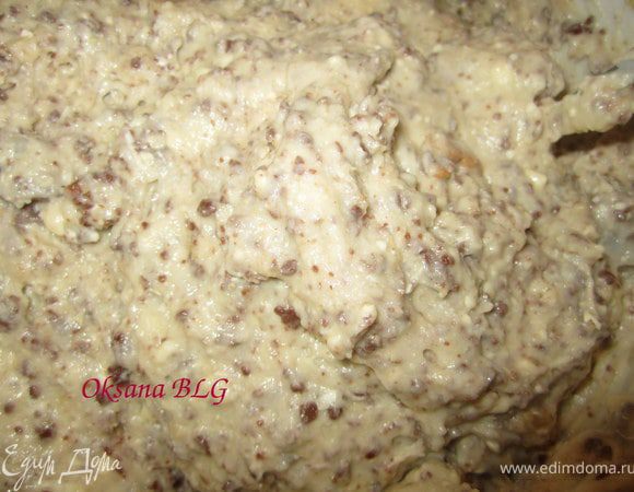 Добавить смесь из кураги, орехов и шоколада. Перемешать.