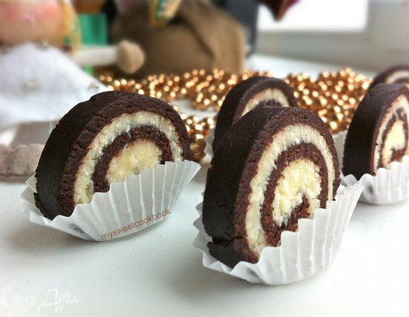 Разрезать по желаемой ширине: мне понравилось вот так- как конфетки, только рулетиком:) Простите, разрез получился не таким идеальным, как надо...просто спешила...Но на вкусе это никак не отразилось- второй съемки не было- все съели:) Чего и Вам желаю!
Bon appétit!