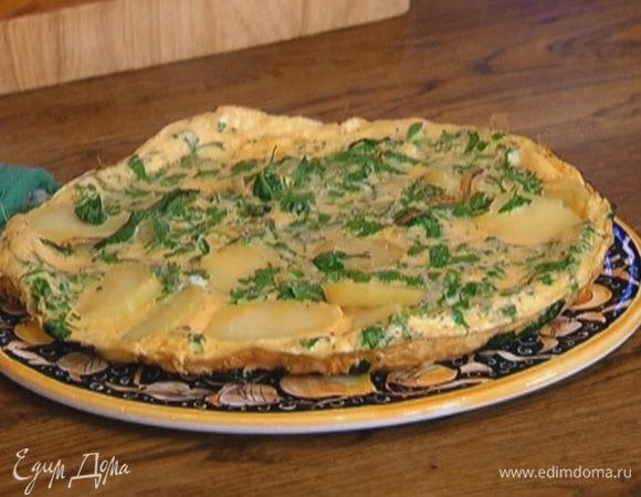 Когда края омлета схватятся, отправить его под гриль на 1–2 минуты.