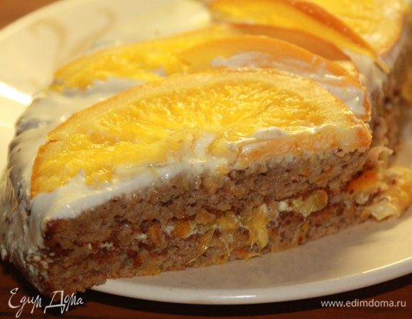 сметану взбить с сахаром , добавить сок и цедру лимона. данную смесь использовать в качестве прослойки. украсить верхний корж кремом и дольками второго апельсина.
Получается очень просто, оригинально, а главное вкусно!!!
