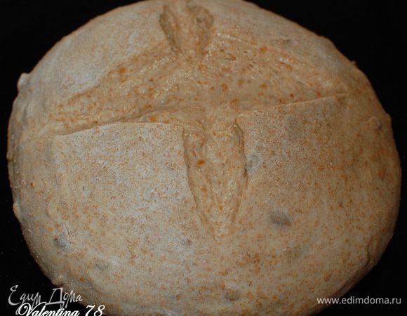 После обмяла  и сформовала шар.Присыпала его слегка цельнозерновой мукой и сделала надрез.(необязательно)
Оставила его подходить приблизительно на 1час- 1.20мин.