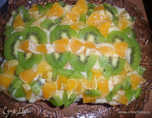 Фрукты чистим и нарезаем, выкладываем сверху. Для приготовления желе: вскипятить воду, всыпать готовое желе из пакетика и хорошо размешать, полить им пляцок. Дать желе немного застыть. Поставить в холодильник на ночь. Приятного чаепития!!!