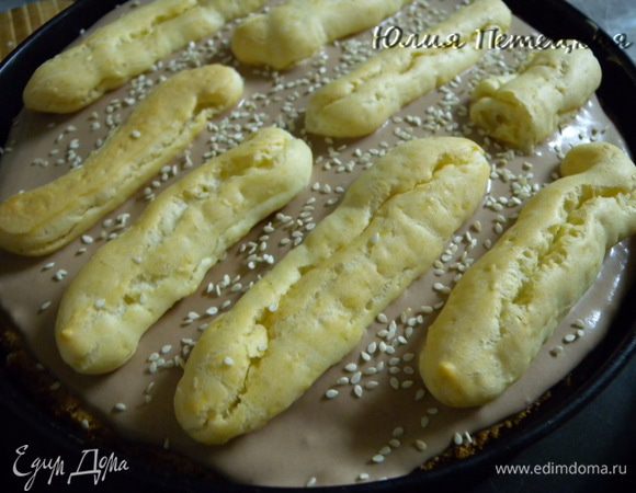 Посыпать кунжутом 