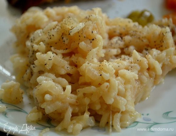 Как только рис разбухнет добавим остатки бульона и готовим еще16-20мин.Добавим пармезан и перемешаем,подаем к столу.