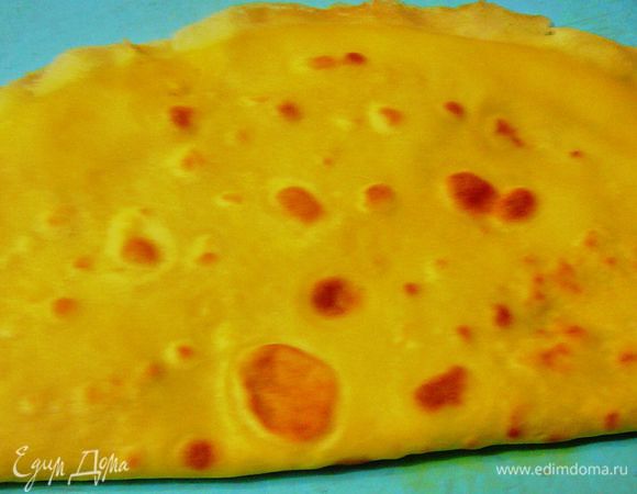 Свернуть блин пополам.