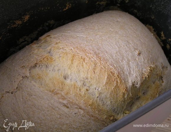 Готовый хлеб вынуть из контейнера, остудить на решетке.