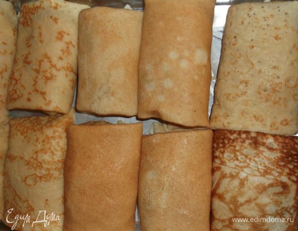 складываем блинчмки в смазанную маслом форму,заливаем сметаной или сливками и ставим в разогретую до 180 гр духовку минут на 15