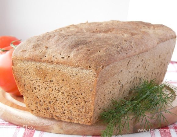 Духовку прогреть до 250 градусов. Выпекать хлеб первые 10 минут с паром . Затем уменьшить температуру до 200 градусов и выпекать хлеб  еще 40 минут.