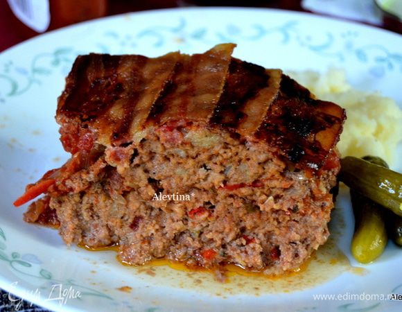 Поставим в духовку на 90 минут. После дадим слегка остыть и разрезаем на порции. Приятного аппетита.