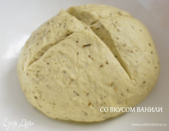 Тесто хорошо вымесить. Затем положить его в смазанную олив. маслом посуду  и сделать крестообразный надрез. 