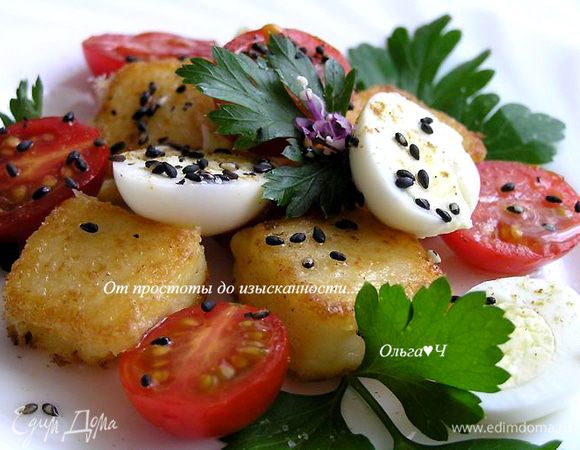 Посыпать кунжутом, сбрызнуть оливковым маслом и соком лимона, присолить, поперчить. Украсить цветками базилика и подавать. Приятного аппетита! ;)