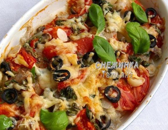 Готовую рыбку вынимаем из духовки. Присыпаем листиками свежего базилика.