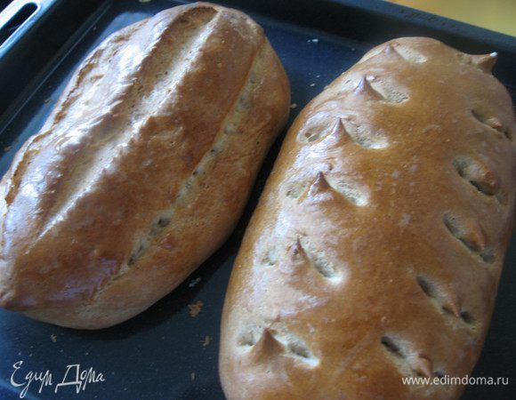   Ставим в разогретую до 180 гр. духовку на 35 минут. Достаем и еще горячие хлеба смазываем сливочным маслом