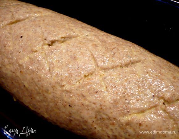 Свернем рулет и положим его в смазанную сливочным маслом форму. Делаем неглубокие надрезы, как при выпечке хлеба, так чтобы при выпечке показалась немного апельсиновая начинка. Смажем верхушку кекса желтком, смешанным с яйцом. Поставим в духовку на 45 минут. Приятного чаепития!!!