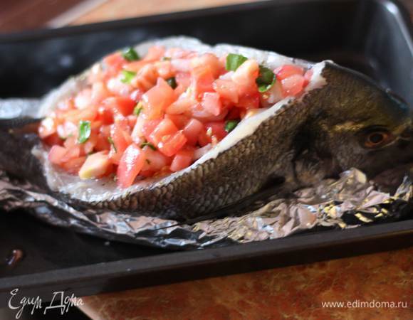  Заполняем рыбные "карманы", сбрызгиваем оливковым маслом и ставим в разогретую до 200 градусов духовку на 20-25 минут.