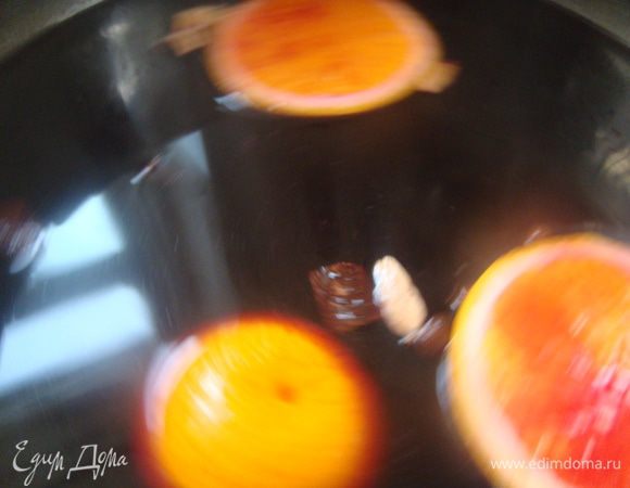 Дать настояться час, можно под крышкой, я остужала просто. Позже отжать в вино апельсин, массу всю процедить в графин.