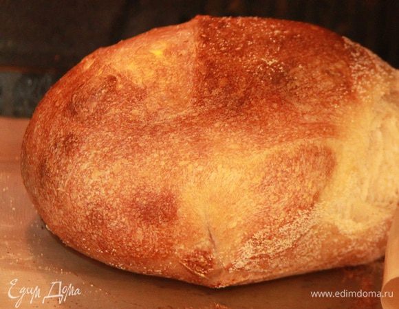 Выпекать в предварительно разогретой до 230*С духовке с паром (сбрызнуть духовку из пульверизатора) сначала 5-7 минут, затем уменьшить температуру до 210*С и печь ещё 20 минут.