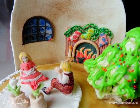 Вылепить фигурки Кая и Герды, горшочки с розами, коврик. Скомпоновать и приклеить с помощью айсинга. Сама стеночка очень хорошо соединилась с верхним ярусом с помощью масляного крема.