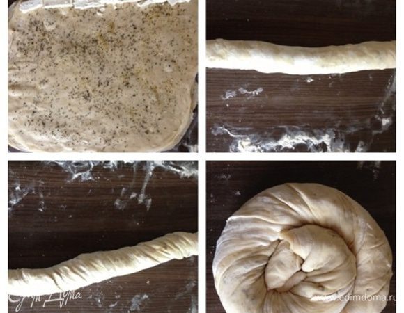 Делаем тоже со всеми частями теста. На край последнего пласта кладем порезанный брусочками сыр фета.Сворачиваем рулетом и защипываем края.Теперь рулет "отожмем" в жгут насколько это получится.Скручиваем в улитку, смазываем растительным маслом, посыпаем травками и отправляем в разогретую до 180 градусов духовку на 40 минут.