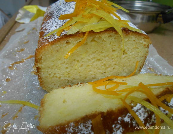 Остывший пирог украшаем сахарной пудрой и цедрой проварившейся в сиропе.

Приятного чаепития и цитрусового вам настроения!