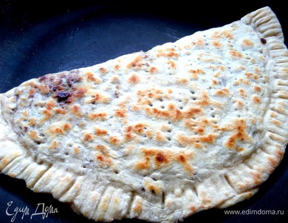 Пока жарится нижняя сторона...