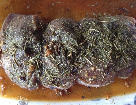 Натереть мясо этим маринадом , связать, посыпать приправой( у меня армянская, в состав который входит базилик, петрушка, кинза(киндза), укроп, цитрон) и оставить на 2-3часа. 

Я мариновала в стеклянной емкости, в которой можно запекать, если у вас нет такой, то можно использовать фольгу.