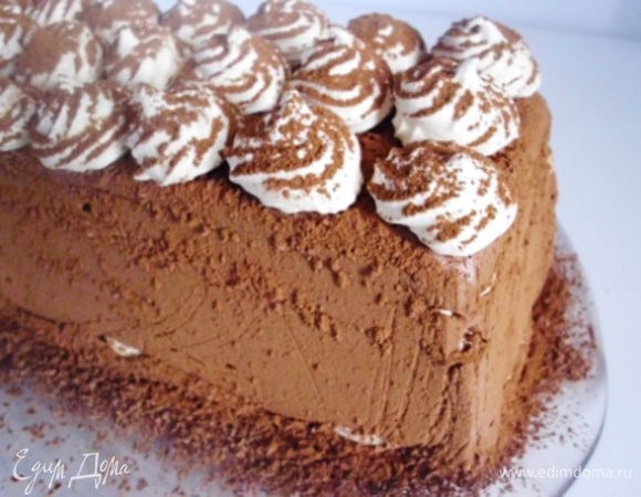 Сверху выложить маленькие безешки и  присыпать какао.
