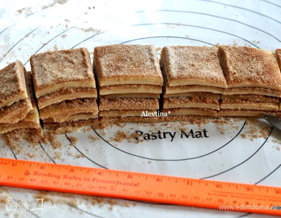 Сложим друг на друга и разрежем вертикально по линейке или на глаз.
