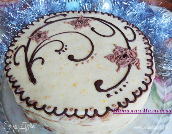 Украсить по желанию. Я нарисовала узоры растопленным белым и черным шоколадом. Бежевые цветочки - смесь черного и белого шоколада.