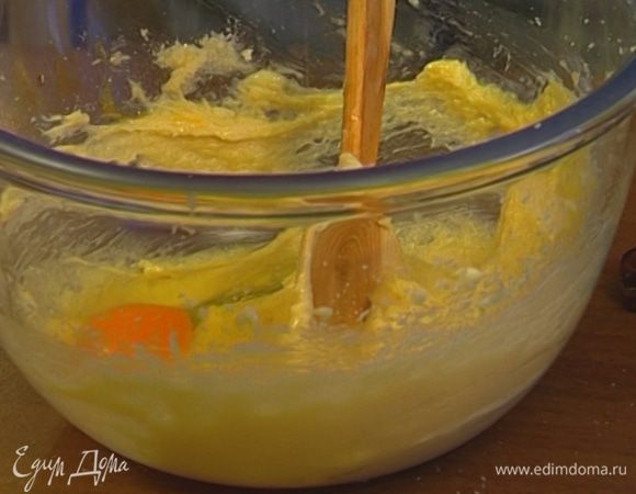 Продолжая взбивать, по одному ввести яйца.