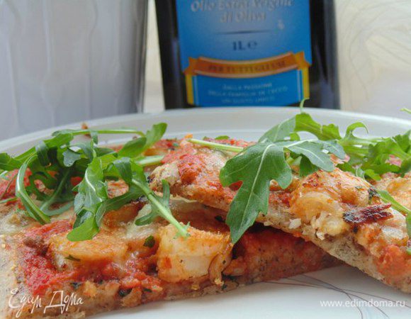 Готовую пиццу посыпать рукколой.

Buon appetito!