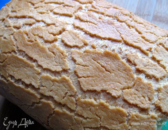 Вынуть хлеб из духовки. Дать остыть и наслаждаться. Можно слегка смазать сливочным маслом корочку.