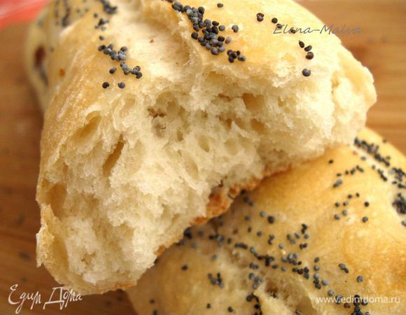  Убавить температуру до 230С и выпекать до золотистого цвета, минут 35 - 40           (после 20 минут нахождения батонов в духовке – проверьте их). Если вы выпекаете полную порцию (из теста на 500 г муки), время соответственно скорректируйте. Вынуть, положить на решетку для остывания. Батоны можно употреблять не сразу, спустя некоторое время. Приятного аппетита!