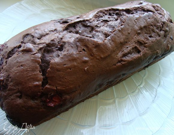 Выпечь кекс в предварительно разогретой духовке до 180-200С около 30 минут.